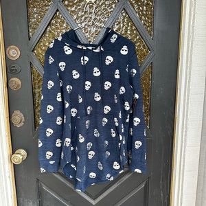 Blue pull over hoodie with silver skulls